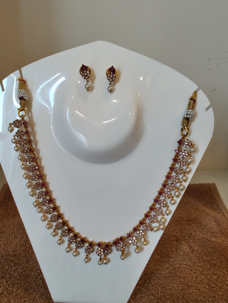 Elegant Gold Plated Necklace With AD and Pearls
